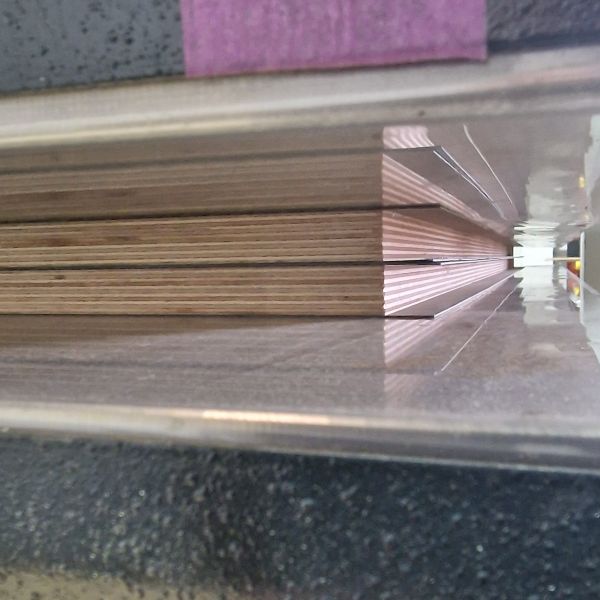 Laminating press in operation